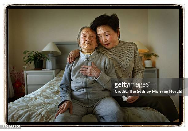 Chinese born Cuiyu Hu aged 104 has lived in Australia for the last ten years. Photographed with her adopted daughter Motoko Otani. The family are...