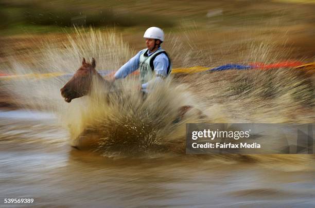 Lancefield Mountain Races. Winner Aaron Thege on Tambo hits the water course during the 3.7km Novic Race. 5th March 2005 AGE NEWS Picture by NICOLE...