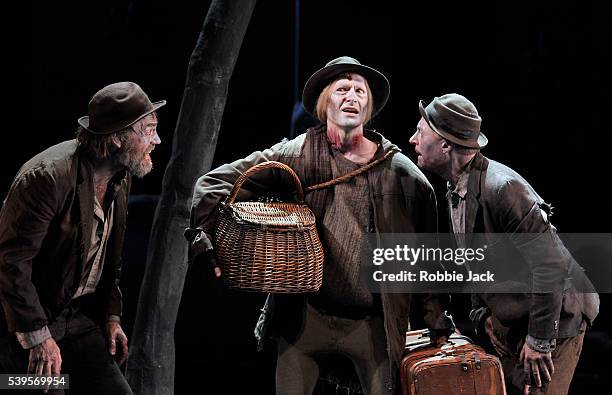 Hugo Weaving as Vladimir, Luke Mullins as Lucky and Richard Roxburgh as Estragon in Sydney Theatre Company's production of Samuel Beckett's Waiting...