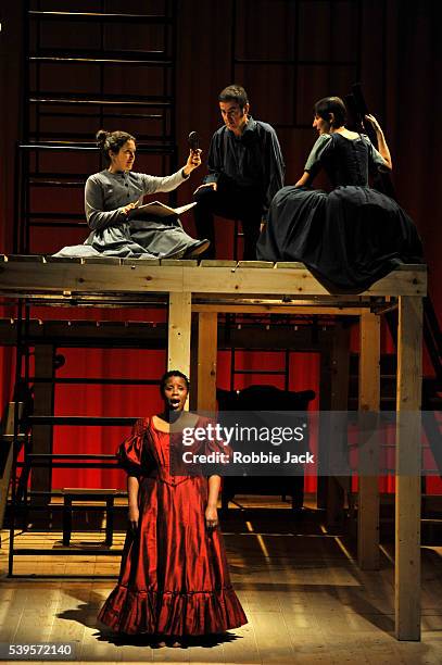 Madeleine Worrall as Jane Eyre and Melanie Marshall as Bertha Mason with artists of the company in an adaptation of Charlotte Bronte's Jane Eyre...