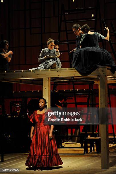 Madeleine Worrall as Jane Eyre and Melanie Marshall as Bertha Mason with artists of the company in an adaptation of Charlotte Bronte's Jane Eyre...