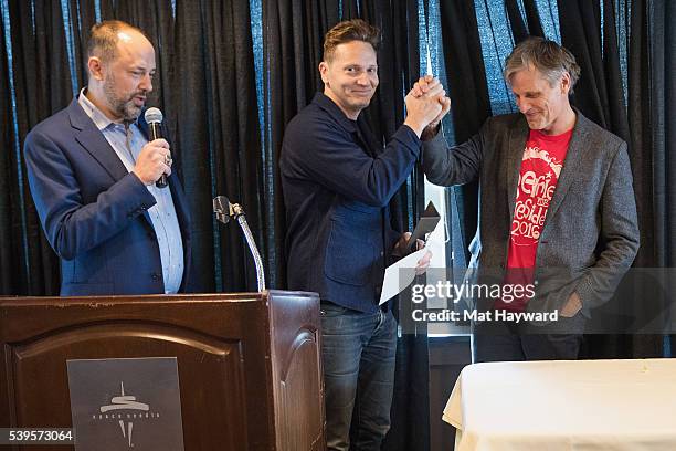 Festival Director Carl Spence presents the Seattle International Film Festival Golden Space Needle Award for best film "Captain Fantastic" to...