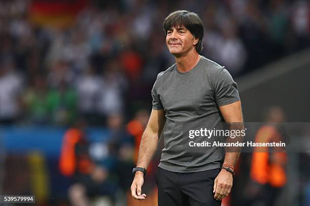 Joachim Loew head coach of Germany celebrates his team's first goal during the UEFA EURO 2016 Group C match between Germany and Ukraine at Stade...