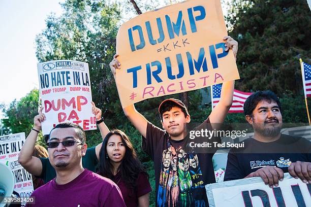 Hundreds of anti and pro Donald Trump demonstraters out front of the Luxe Hotel in Los Angeles. Presidential candidate Donald Trump spoke to a group...