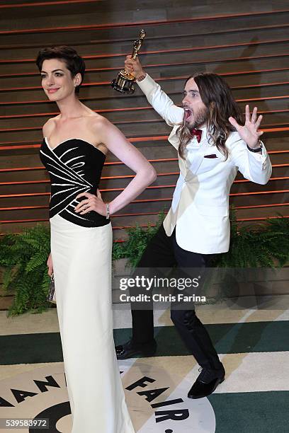 March 2 West Hollywood, Ca. --- Actor Jared Leto surprises actress Anne Hathaway as they arrive at the 2014 Vanity Fair post Oscar party in West...