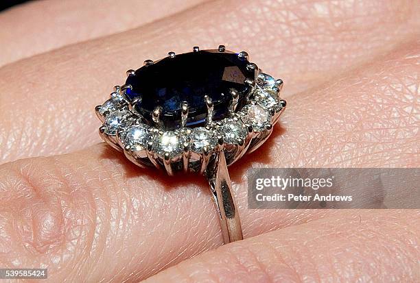 Kate Middleton, wearing her engagement ring which once belonged to Diana, Princess of Wales, on the day her engagement to Prince William was...