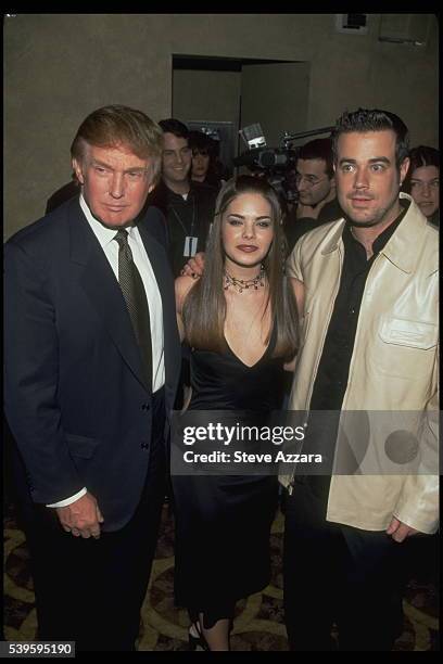 Trump, pageant sponsor, with Kimberly Pressler & Carson Daly .