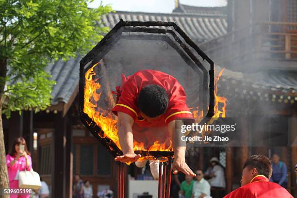 Craftmen performance to attract tourists at a new Movie and Television City in Xiangyang, Hubei province, central China Friday May 9, 2015