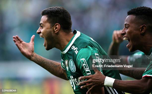 Cleiton Xavier of Palmeiras celebrates scoring the first goal with Tche Tche during the match between Palmeiras and Corinthians for the Brazilian...