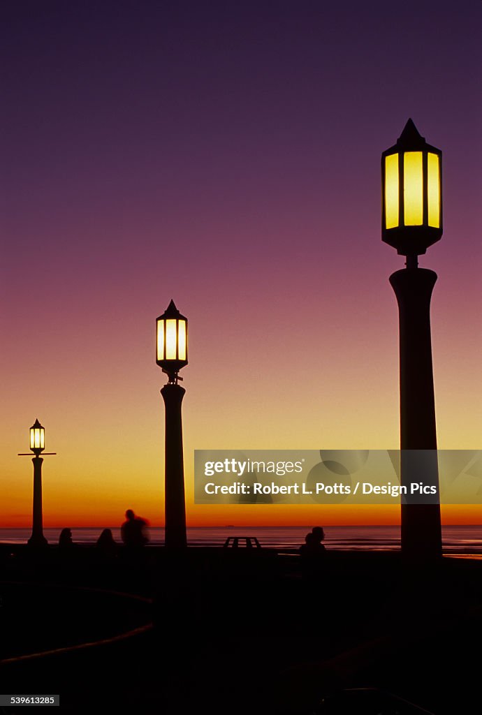 The streetlights come on at dusk