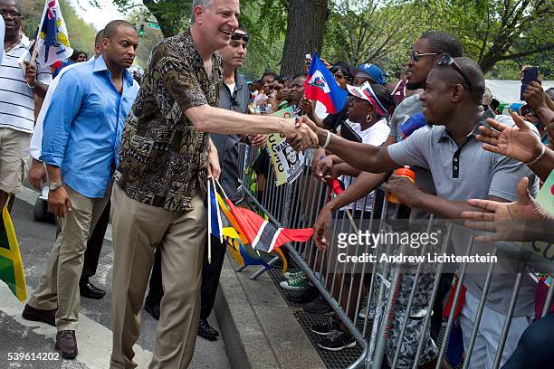 New York City Mayor Bill De Blasio marches in Brooklyn's West Indian Day Parade with his popular family, Chirlane McCray, his wife, Dante, his son,...
