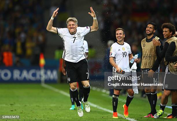 Bastian Schweinsteiger of Germany celebrates scoring his team's second goal during the UEFA EURO 2016 Group C match between Germany and Ukraine at...