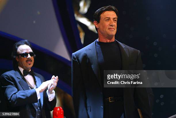 Actor Sylvester Stallone inducts Hulk Hogan into the WWE Hall of Fame during ceremonies at Universal Amphitheatre.