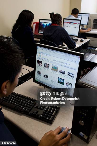 Highschool Student At Computer Photos and Premium High Res Pictures ...