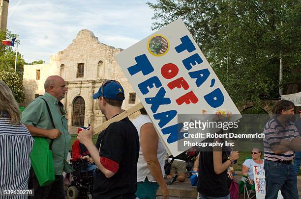 Some of the thousands of Texans gathered in front of the Alamo in downtown San Antonio for a "Tea Party" protesting federal bailouts and President...