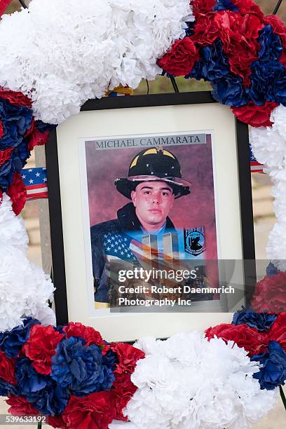 Picture of 22 year old New York firefighter Michael Cammarata is on display as High school students in the Junior ROTC program at Akins High School...