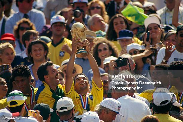 Brazilian players hold the trophy after their victory over Italy in the final of the 1994 FIFA World Cup.