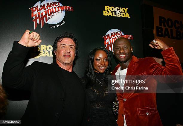 Actor Sylvester Stallone, Tarver's fiance Denise Booth and actor and boxing champion Antonio Tarver arrive at the Las Vegas premiere of "Rocky...