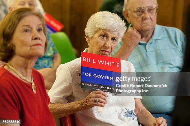 Texas woman listens to Democratic candidate for Texas governor Bill White campaign at the Greggton Community Building public meeting in Longview in...