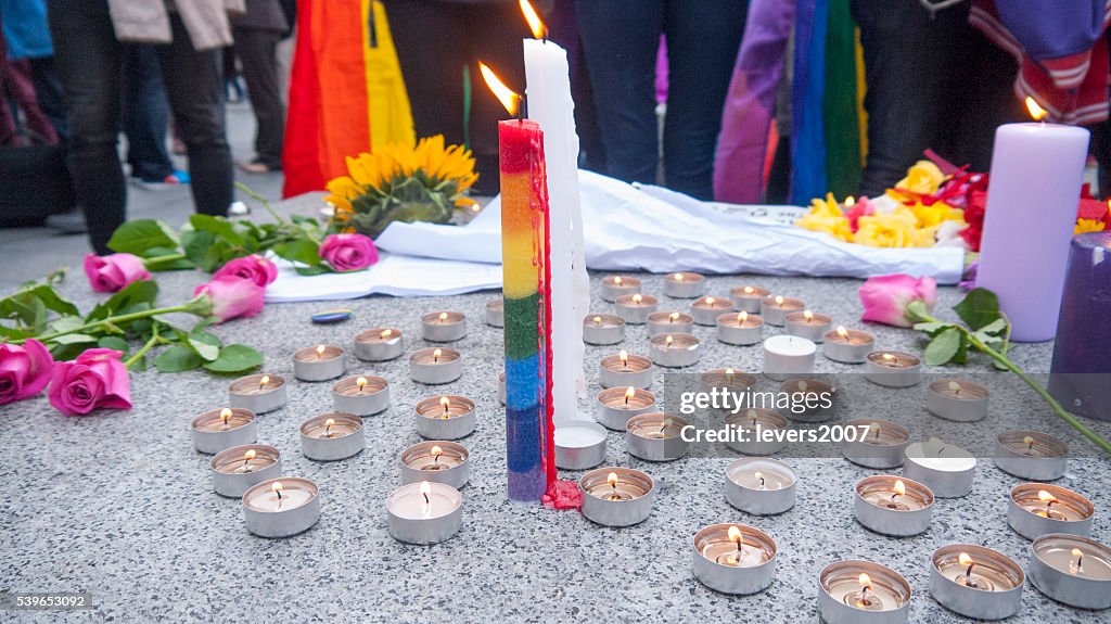 Rainbow pride candle and flowers