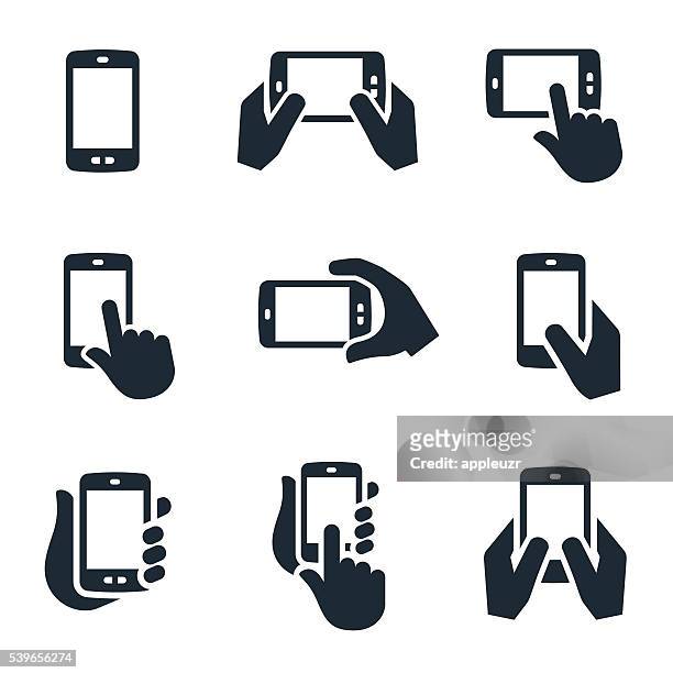 illustrazioni stock, clip art, cartoni animati e icone di tendenza di icone di smartphone - mano umana