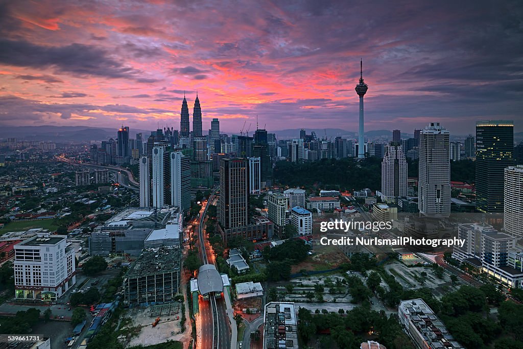 Malaysia, Kuala Lumpur, Sunrise over city