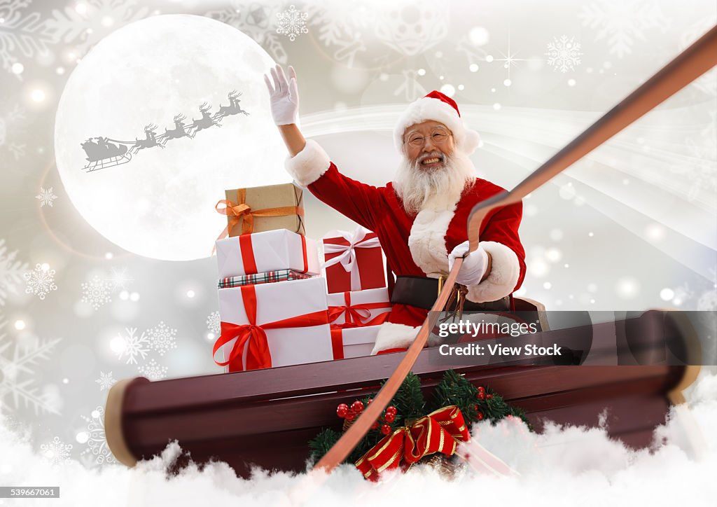 Santa Claus in Sleigh with gifts