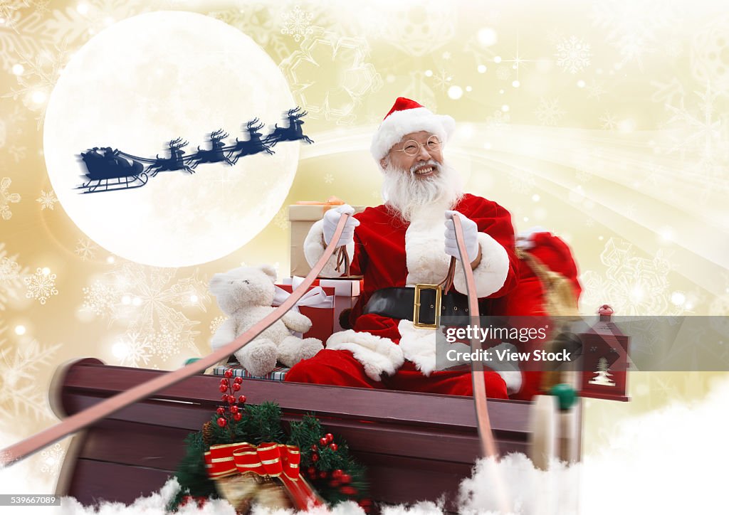 Santa Claus in Sleigh with gifts