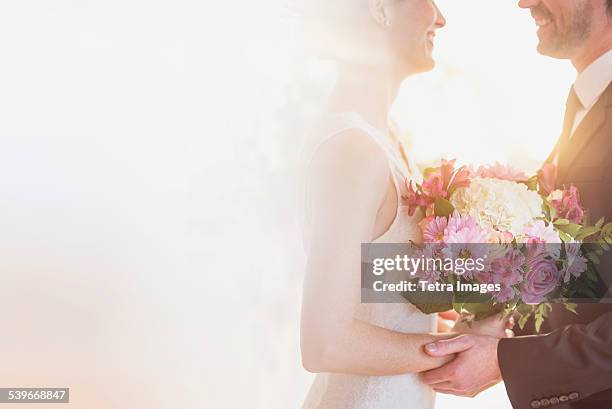 usa, new jersey, bride and groom celebrating their wedding - wedding couple laughing stock pictures, royalty-free photos & images