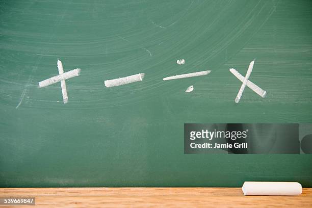 mathematical symbols on chalkboard - subtraction stock pictures, royalty-free photos & images