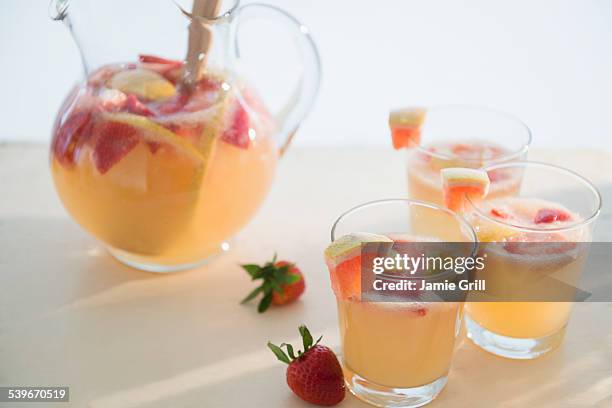 studio shot of fruit cocktail - sangria stockfoto's en -beelden