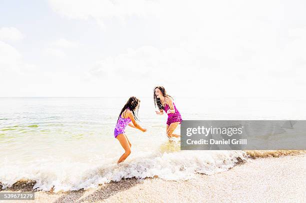 usa, florida, jupiter, girl (6-7) and her mom enjoying themselves on beach - girls playing with themselves bildbanksfoton och bilder