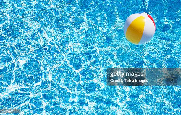 usa, massachusetts, nantucket, beach ball in swimming pool - beach ball stock pictures, royalty-free photos & images