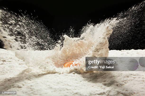 drop egg on wheat flour - flour stock pictures, royalty-free photos & images