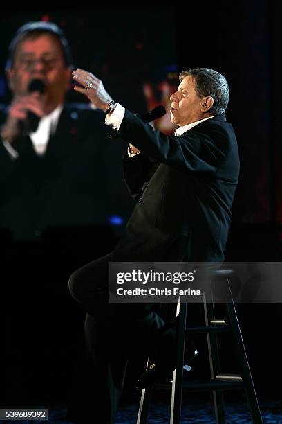 Host Jerry Lewis sings the final song "You'll Never Walk Alone" to close the 42nd Annual Jerry Lewis MDA Labor Day Telethon at the South Point Hotel...