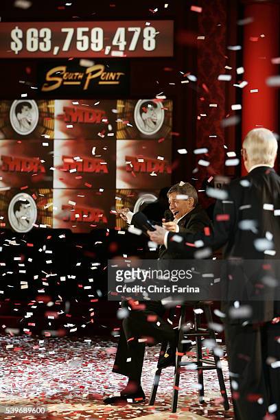 Host Jerry Lewis announces an all-time high record high of $63 478 as co-host Ed McMahon looks on during the final hour of the 42nd Annual Jerry...