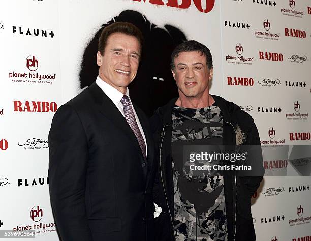 California Governor Arnold Schwarzenegger and actor and director Sylvester Stallone arrive at the world premiere of the movie "Rambo," held at the...