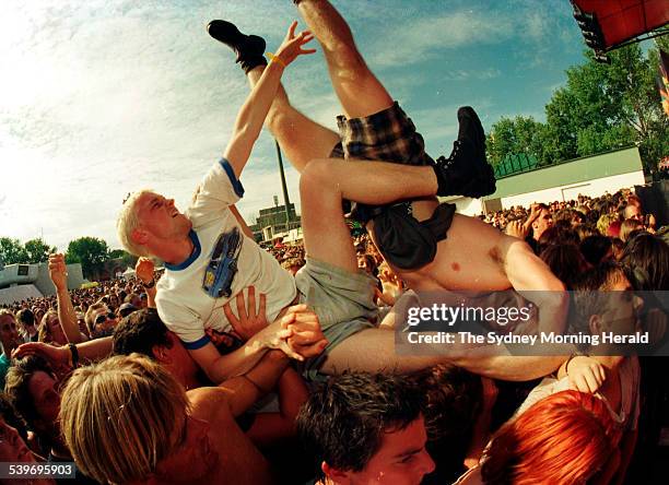 Crowd surfers get into the spirit of Big Day Out, 26 January 1995. SMH Picture by JAMES ALCOCK