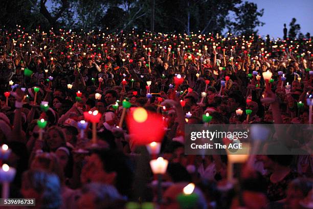 Large crowd enjoys Carols by Candlelight at the Sidney Myer Music Bowl, 24 December 2003. THE AGE PICTURE BY MELANIE FAITH DOVE