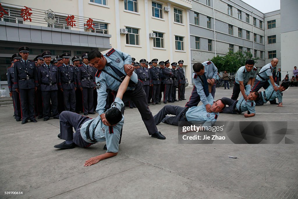 Recruits of security personnels attend a training session in Hami, Xinjiang Uighur Autonomous Region