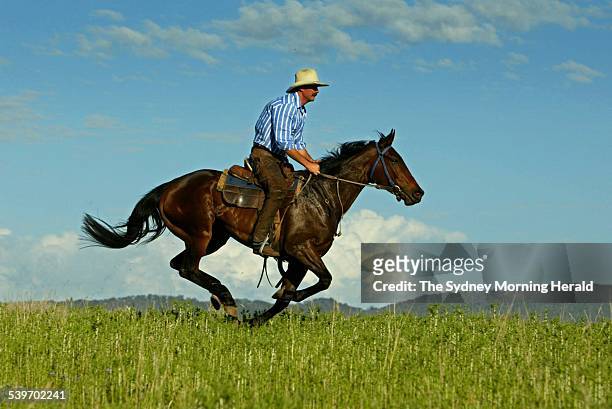 Spring Carnival 2005. Horse trainer, Greg Bennett, during conditioning work on racehorse Donna Uccello on his property in Middlebrook near Scone in...