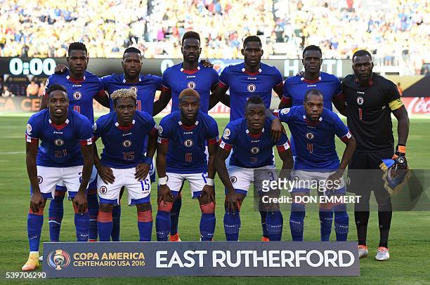 Players of Haiti pose for pictures before the start of their Copa America Centenario football tournament match against Ecuador in East Rutherford,...