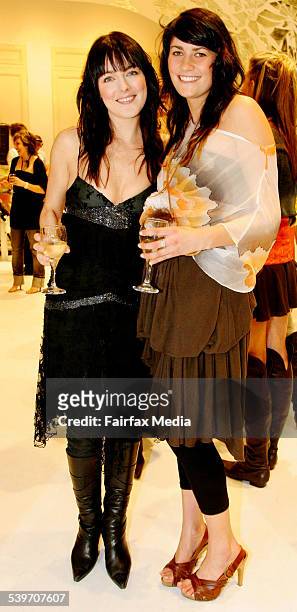 Kate Bell and Natalie Edel at the Sass & Bide store launch on Oxford Street in Sydney, 29 July 2005. SHD Picture by TRACEY NEARMY