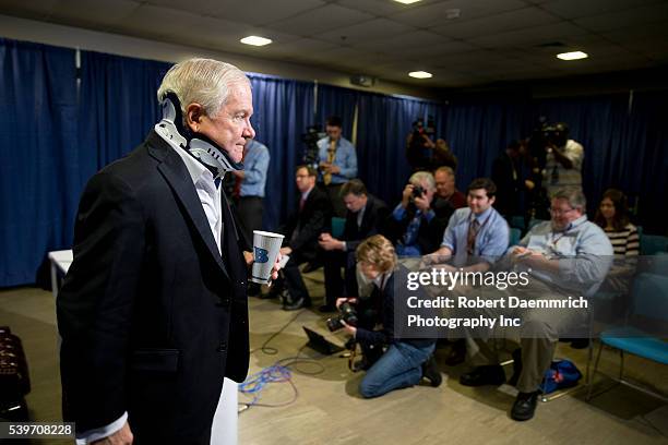 Former Defense Secretary Robert Gates leaves a press conference after talking about his new book, "Duty" that criticizes many Bush and Obama...