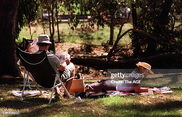 Couple enjoys a picnic at Hanging Rock, 24 February 2002. THE AGE Picture by JAMES BODDINGTON