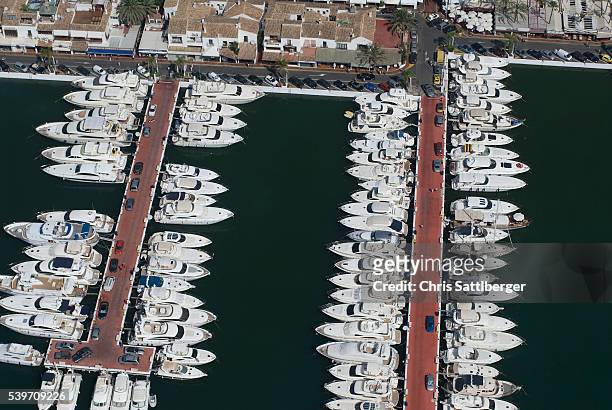 pleasure boats in the marina at puerto banus - puerto banus stockfoto's en -beelden