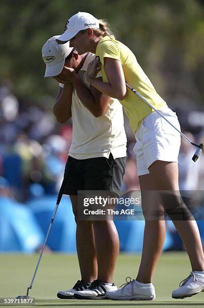 Amateur golfer Amy Yang is hugged by runner-up Catherine Cartwright after winning the ANZ Ladies Masters at Royal Pines on the Gold Coast, 5 February...