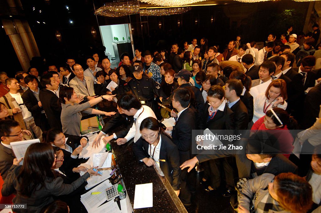 Residents queue for purchasing apartments in Shanghai