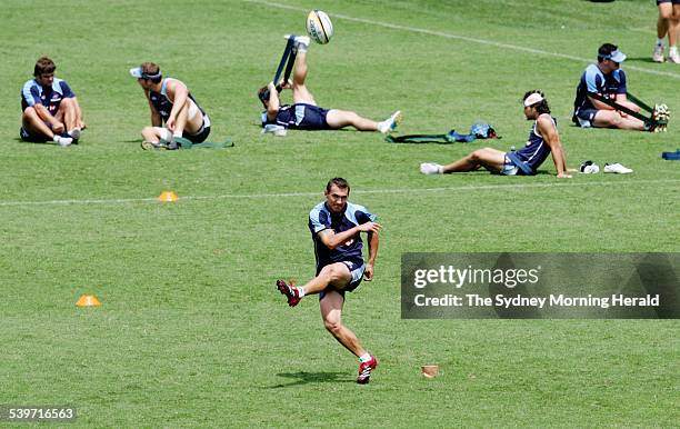 The NSW Waratahs were having a training session at Aussie Stadium. Matt Rogers doing kicking practice at the end of training, 2 February 2006. SMH...