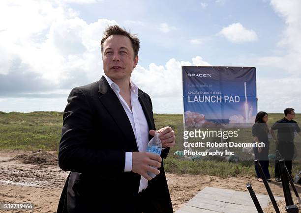 Texas Governor Rick Perry and SpaceX CEO Elon Musk break ground on a new spaceport at Boca Chica Beach in far south Texas
